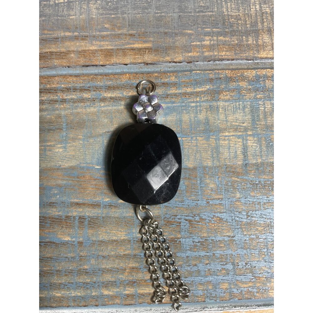 Black Faceted Pendant With Flower Charm & Silver Chain Tassel